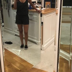 Black leopard print romper. Size L